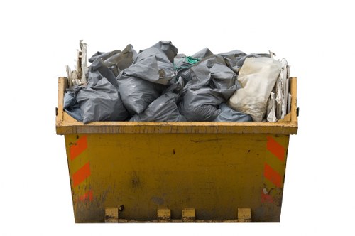 Variety of business waste types including paper and electronics